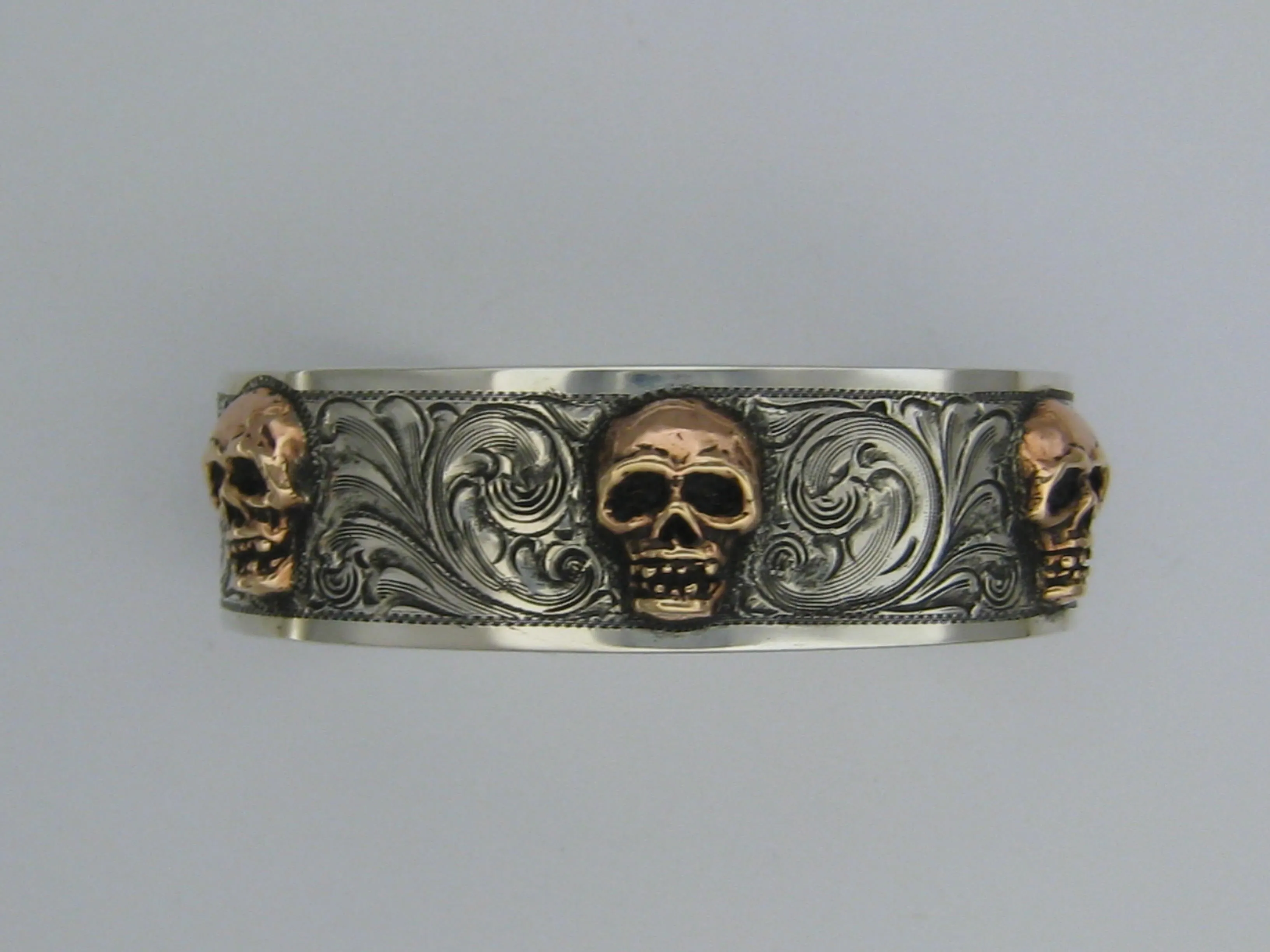 Cuff, Sterling Silver with Copper Skulls, Hand Engraved CB-08