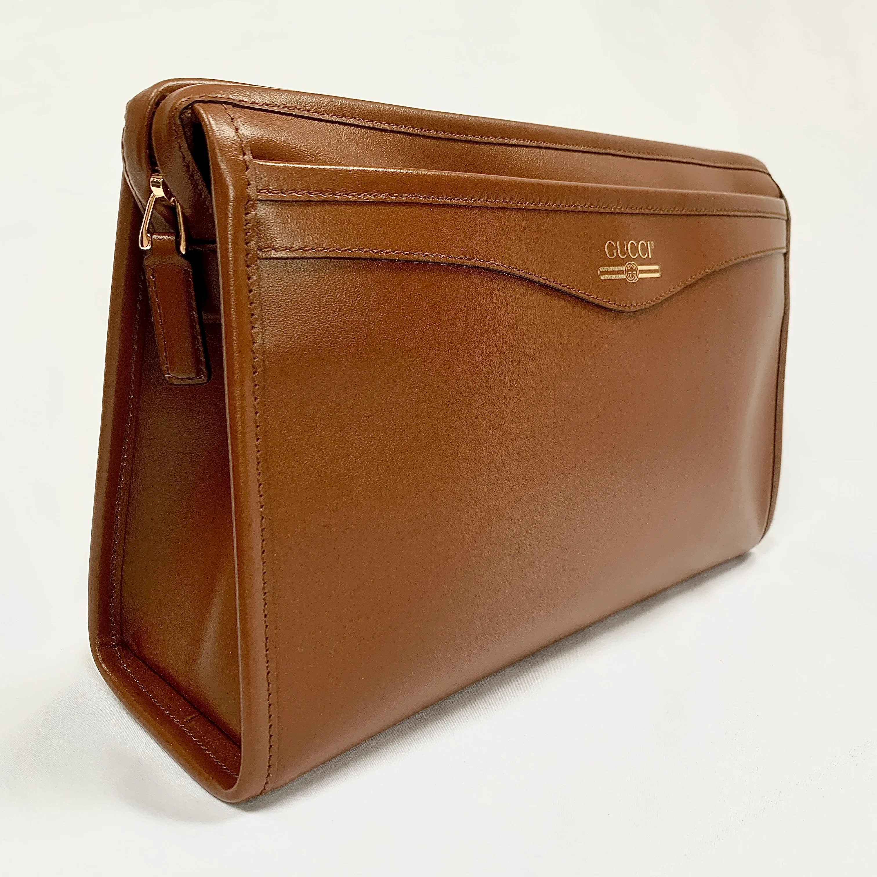 Gucci Metallic Print Logo Smooth Leather Clutch in Brown