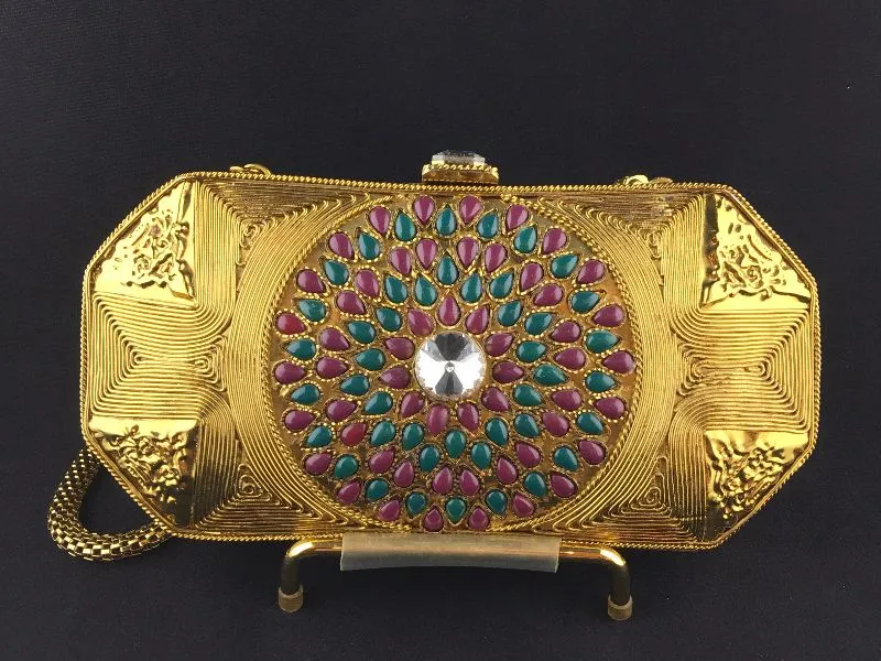 Ruby and emerald colored clutch