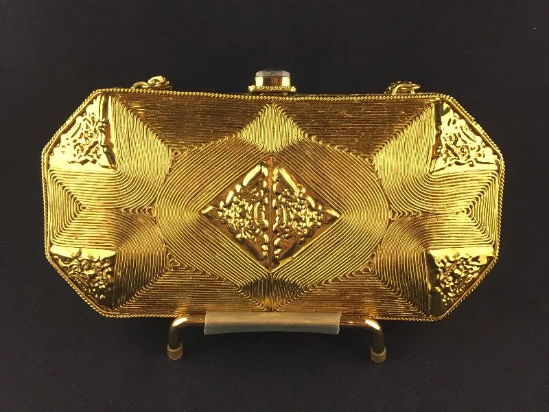 Ruby and emerald colored clutch