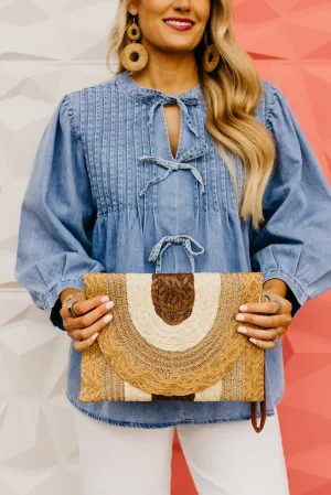 The Ginny Metallic Straw Clutch Bag